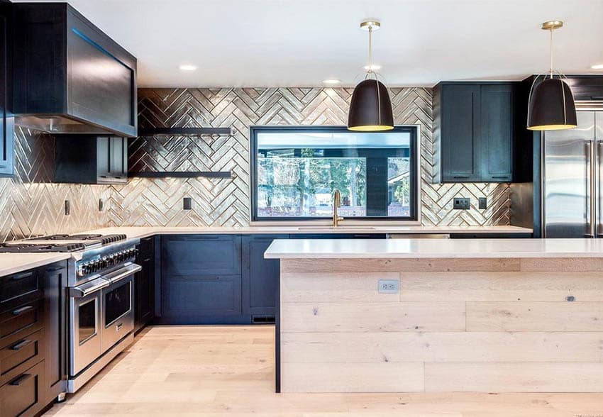 Updated kitchen with black painted cabinets wall tile pattern backsplash bare wood plank island