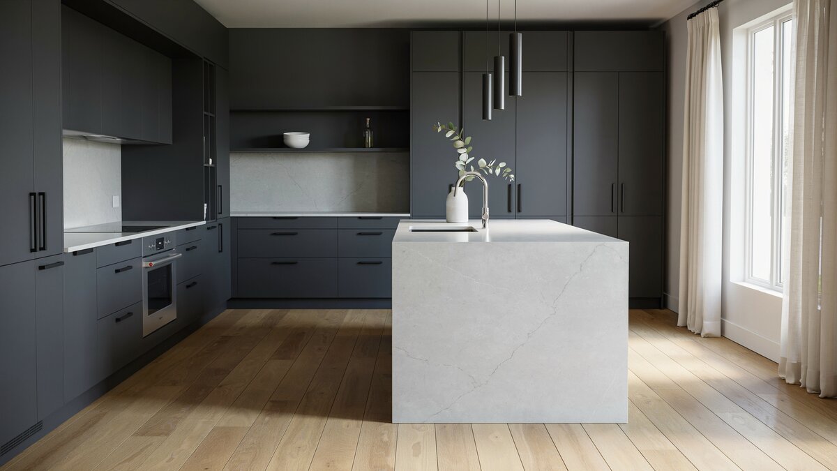 Modern dark gray kitchen centered on a crisp white waterfall island