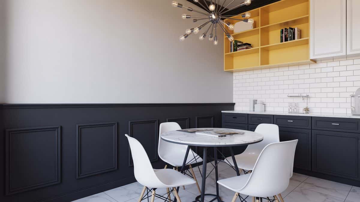 Modern kitchen-dining space with matte black flat panel lower walls, marble-top round table with white molded chairs, and yellow open wall shelving
