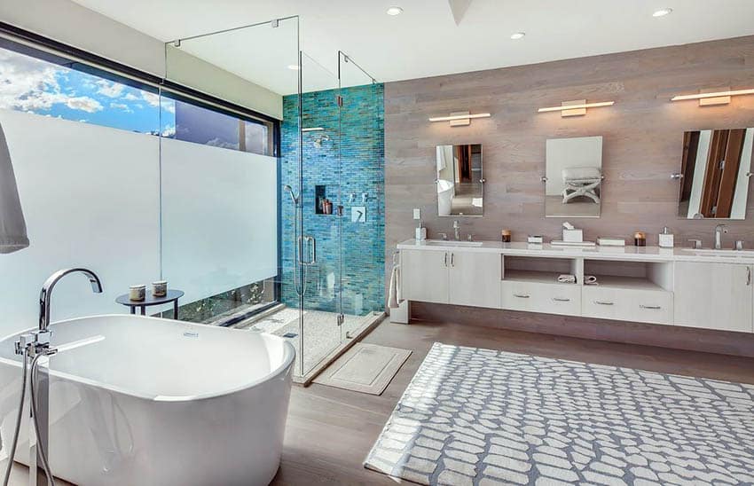 Contemporary bathroom with pebble floor tile freestanding tub