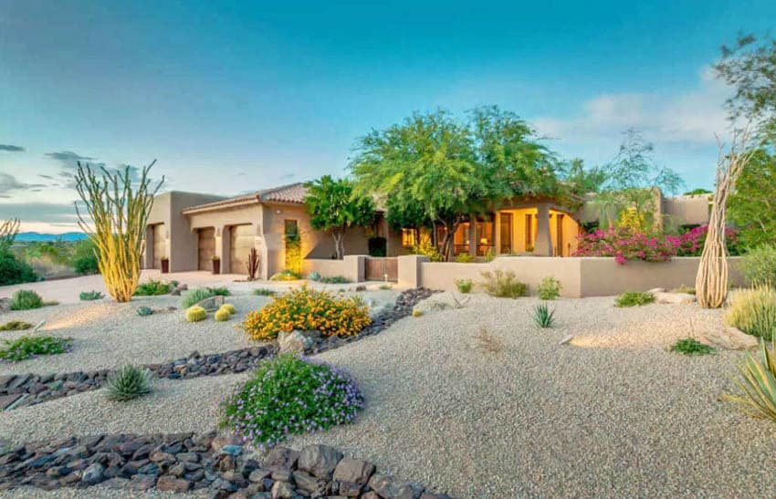 Home with desert rock landscaping