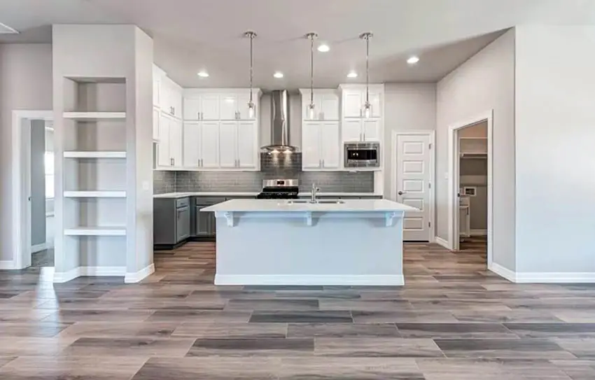 Kitchen with wood look tile floors and open concept