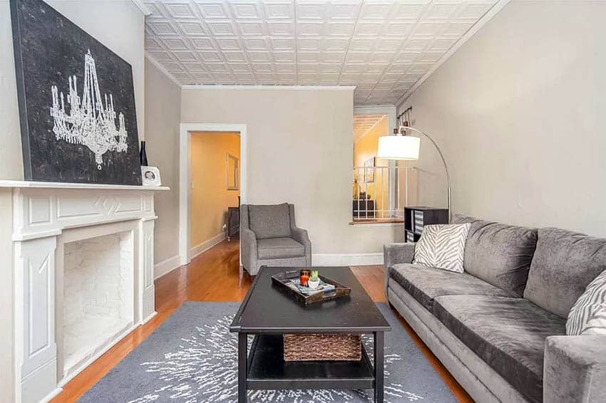 Living room with tin ceiling