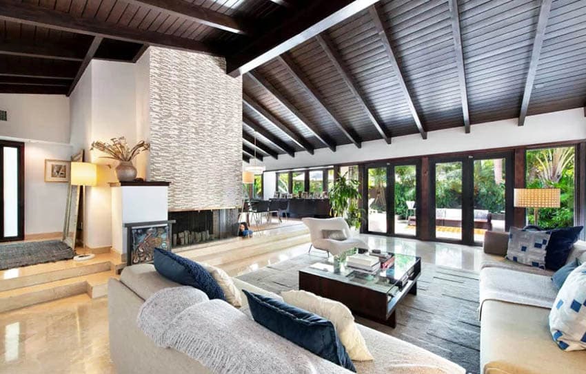 Living room with wood vaulted ceiling