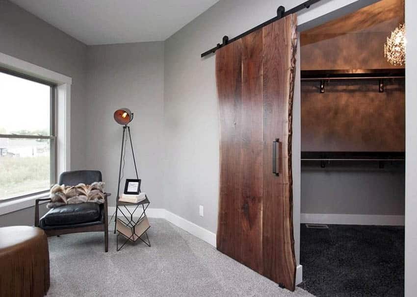 Rustic sliding wood door in living room