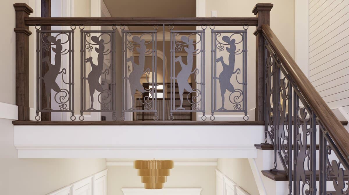 Whimsical family home staircase with custom decorative cutout character silhouette iron railing panels