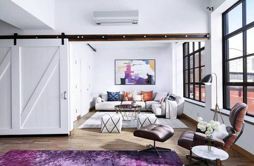 Room with purple rug, Eames chair and airconditioner