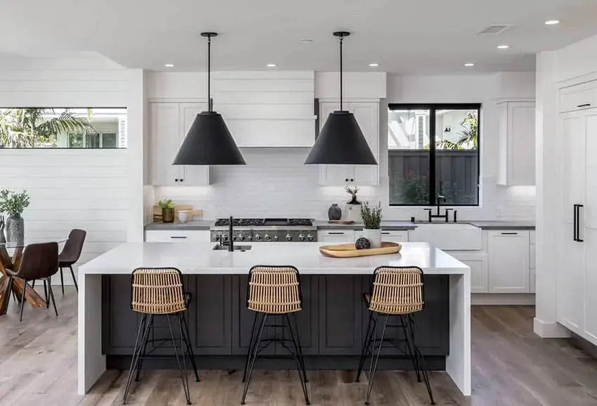 Black And White Kitchen With White Cabinets Black Island Black Lamp Shades .webp