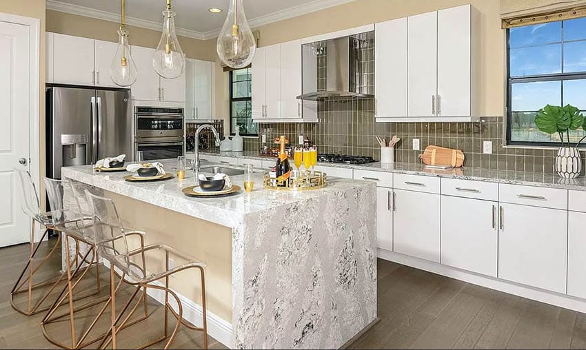 Modern kitchen with summerhill quartz countertops and white cabinets