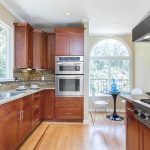 Contemporary kitchen with hickory engineered hardwood floors