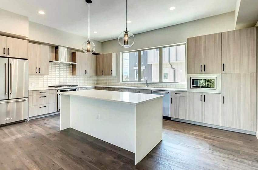 Contemporary veneer cabinet kitchen and white island with globe lights