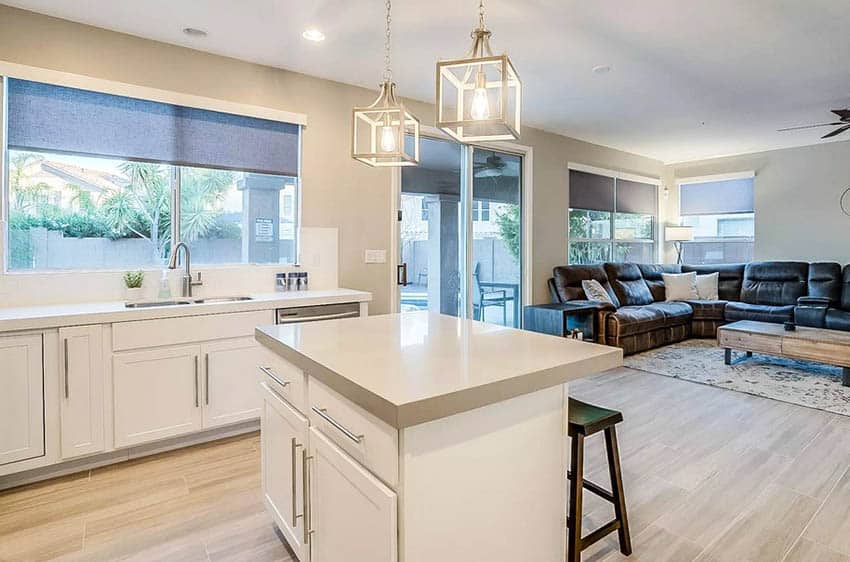 Kitchen with quartz counters, and pull down roller shades 