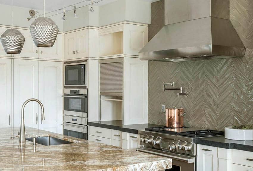 kitchen-with-beige-cabinets-brown-quartz-countertop-island-and-black-soapstone-countertops