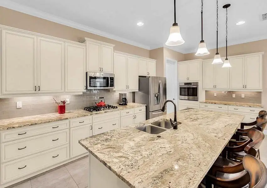 kitchen-with-beige-raised-panel-cabinets-beige-wall-paint-andyellow-granite-countertops