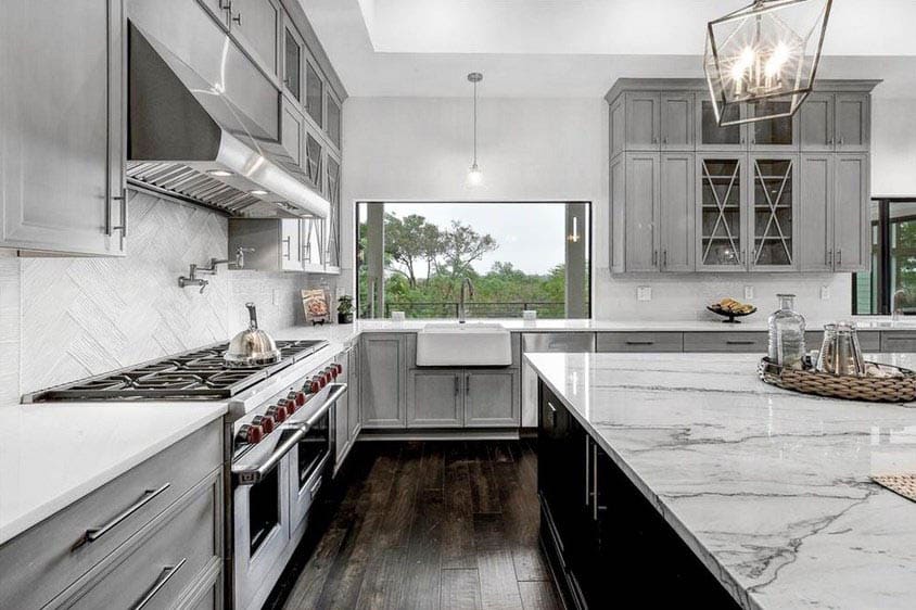 Kitchen with farmhouse sink and large picture window