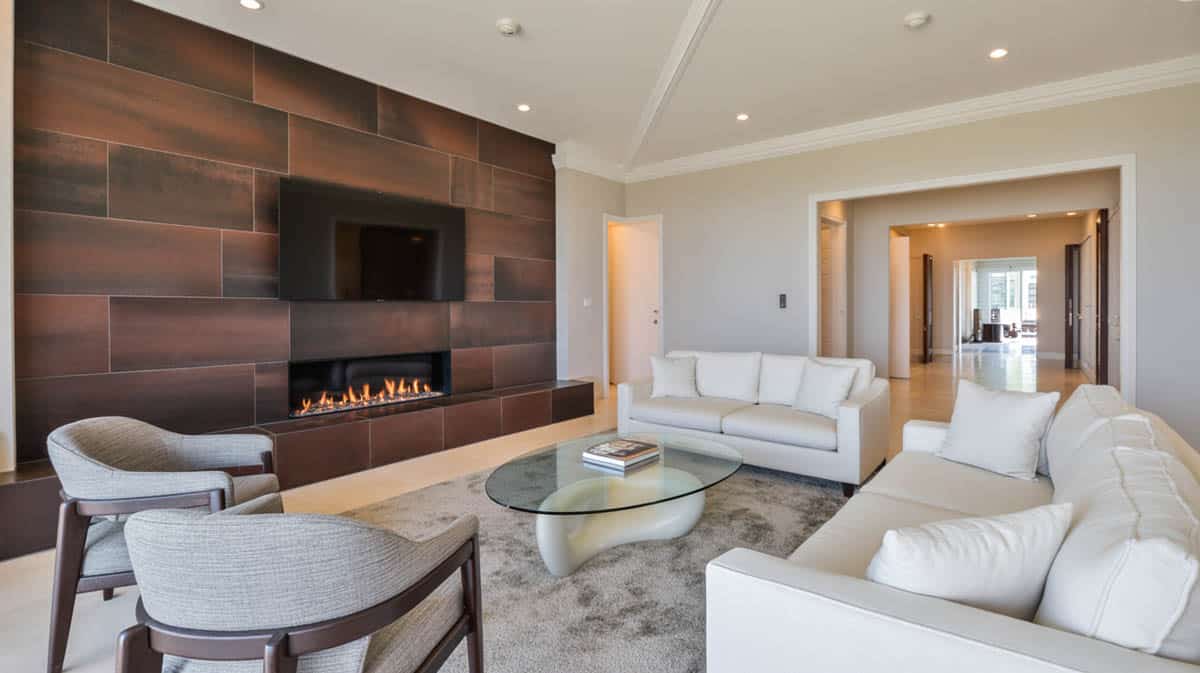This living space is extremely unique with the plush purple accent