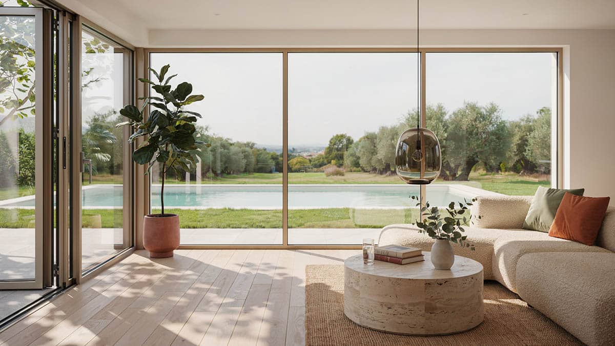 Sunroom with glass panels and pool views
