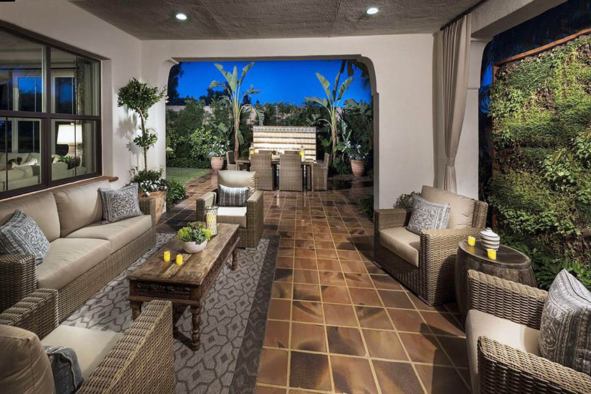 Covered garden patio with outdoor furniture and tile flooring