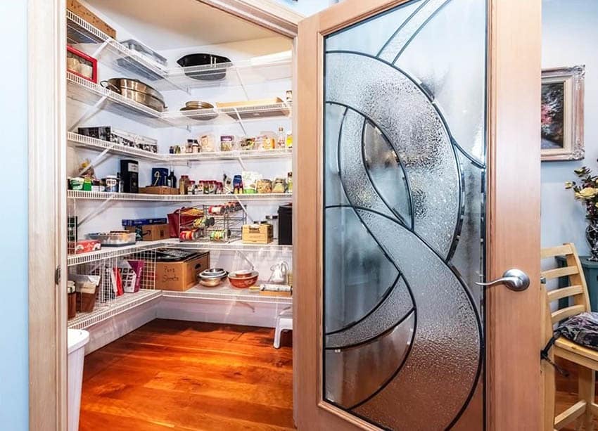 Custom kitchen pantry door with decorative glass window