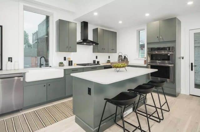 Gray Cabinet Kitchen With White Quartz Counters Staging Decor 640x423 