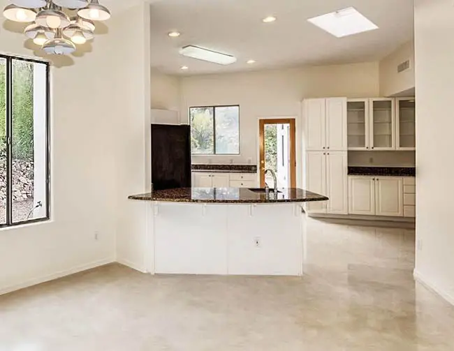 Kitchen with smooth finish concrete floors