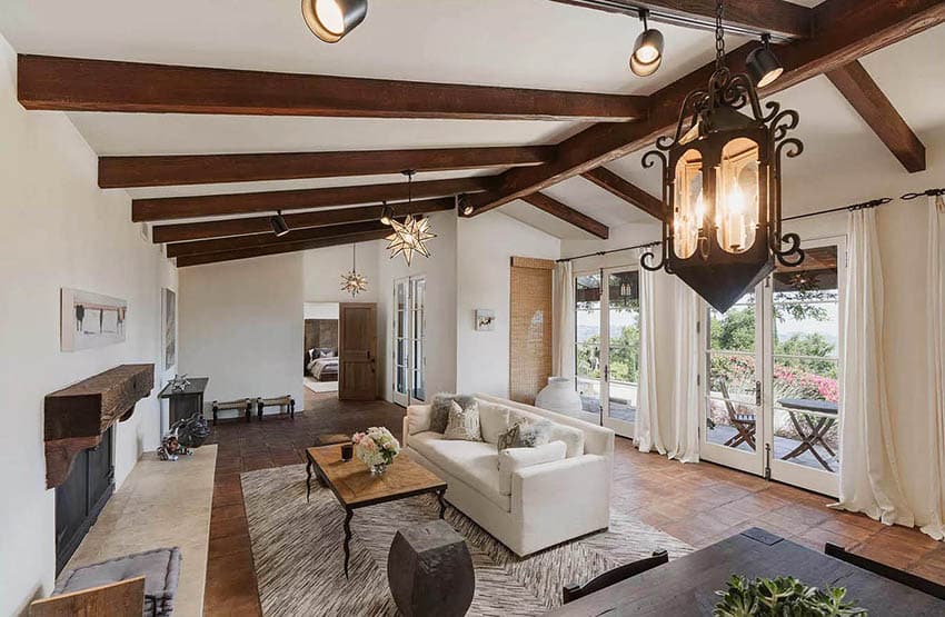Spanish style room with beams and french doors