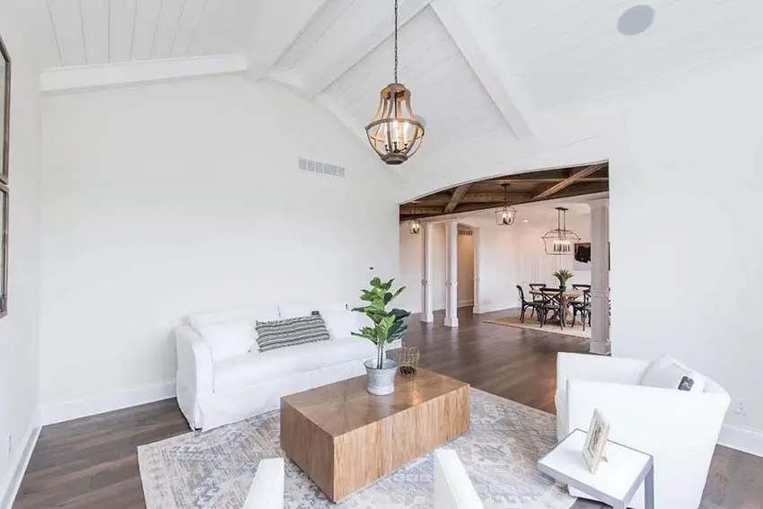 Living room with white shiplap ceiling