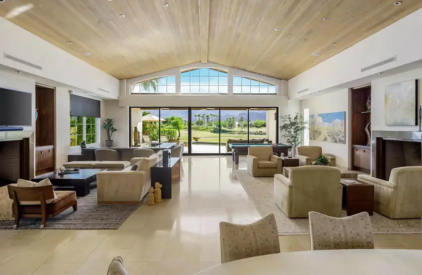 Luxury living room with vaulted ceiling sliding glass doors