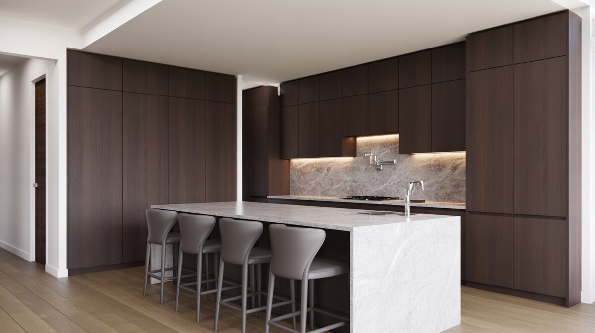 Modern kitchen wrapped in dark espresso cabinets with a bright white marble waterfall island