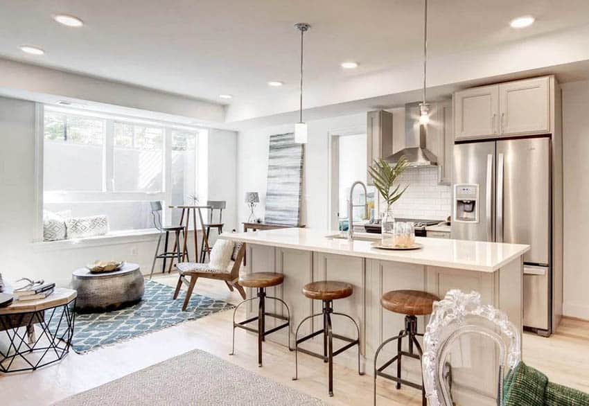 Open concept kitchen with beautiful decor and wood barstools