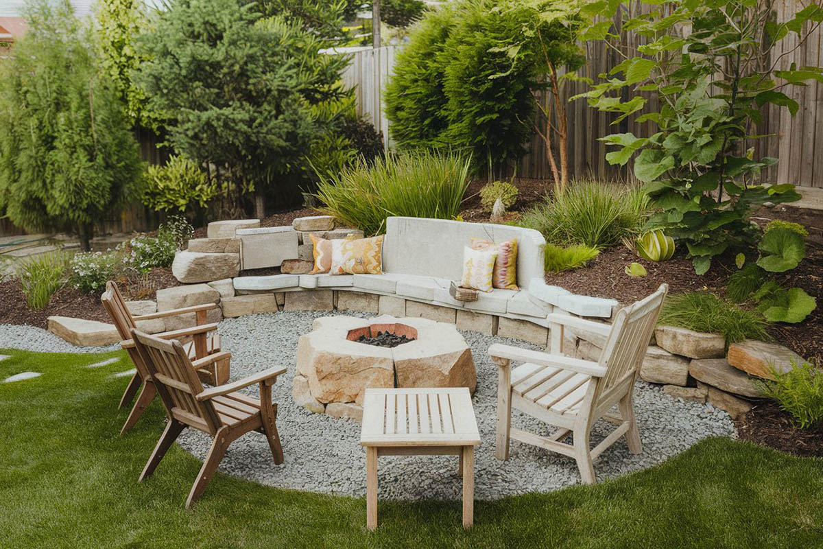 Rock bench around fire pit