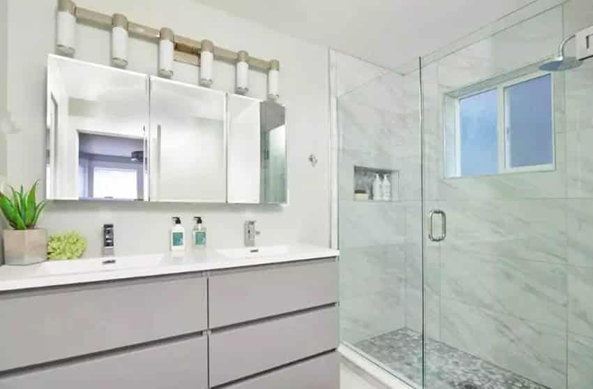 Small modern bathroom with dual sink vanity walk in shower