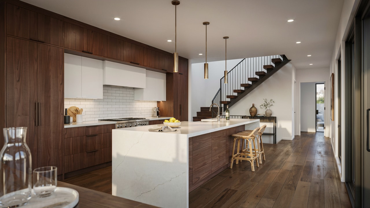 Two-tone kitchen featuring dark walnut uppers and white quartz waterfall island with wood stools