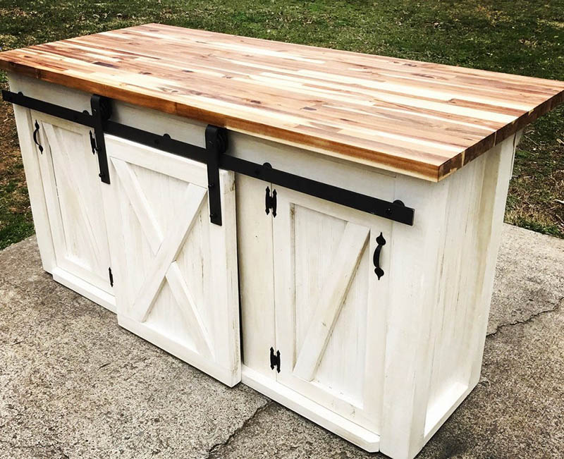 Barn door kitchen island with butcher block countertop