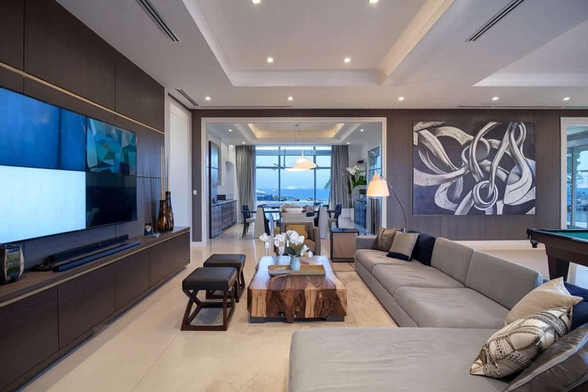 Modern room with raised ceiling and large sectional sofa