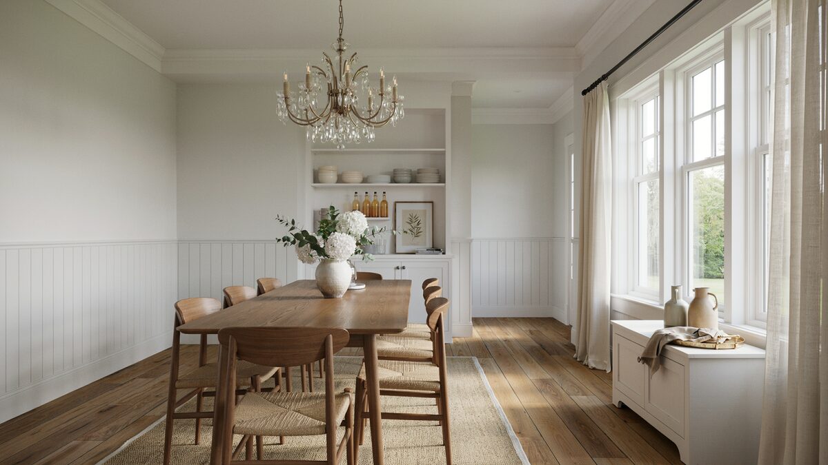 Bright dining room with a crystal chandelier white shiplap wainscoting and tall picture windows