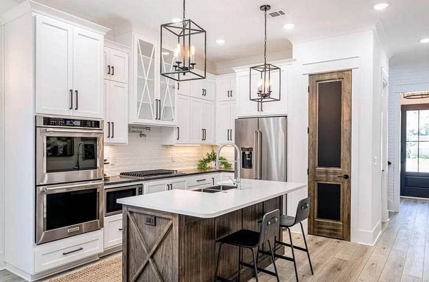 Kitchen with barn door style kitchen island