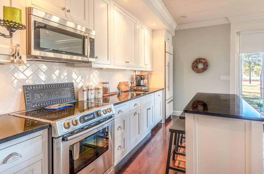 Kitchen with decorative sign on countertop
