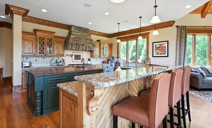 Kitchen with rustic wood breakfast bar island and dark green island with wood countertop