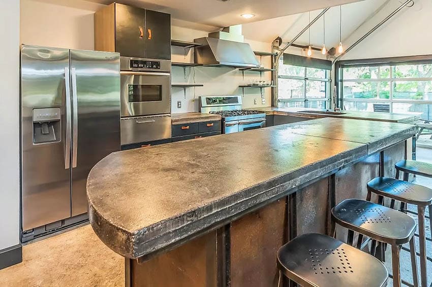 Kitchen with stained concrete countertops
