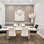 Modern dining room with globe chandelier chrome table chairs