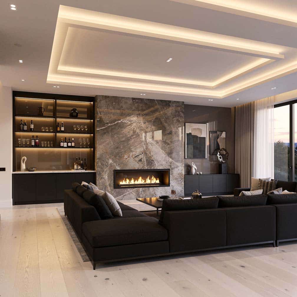 Modern living room with multiple overhead trays, stacked stone fireplace and built-in bar.
