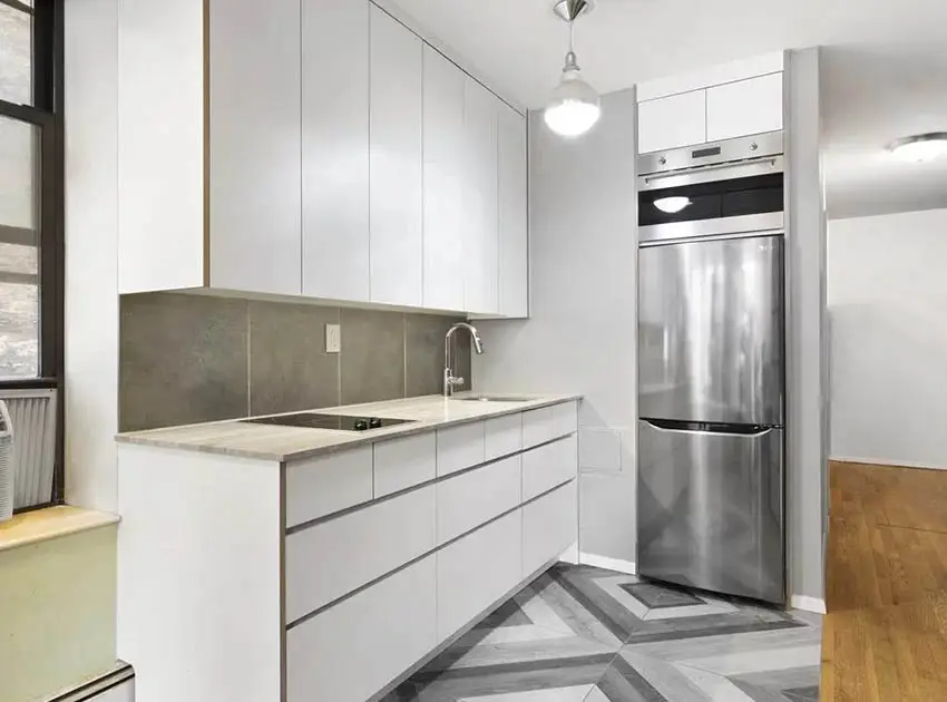 Kitchen with modular cabinets and grey backspalsh