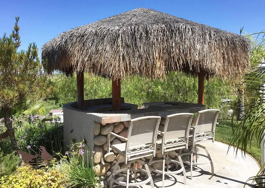 Thatch palapa with stone bar