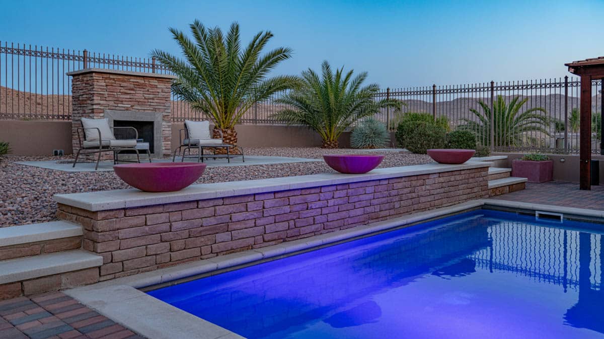 Dramatic lighting around pool