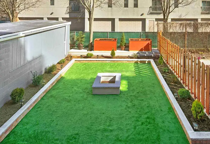Artificial grass patio with fire pit