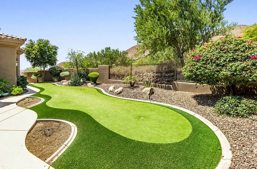 Backyard with custom curved putting green