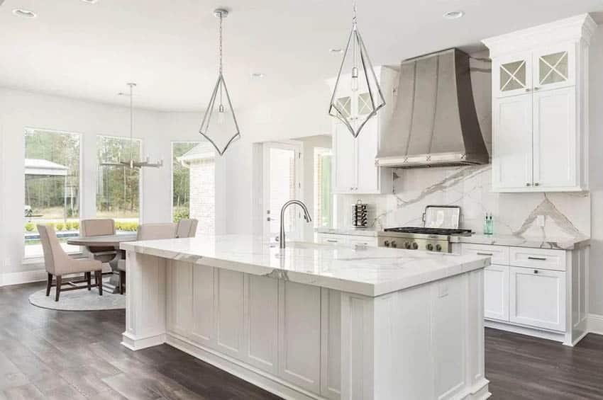 Beautiful kitchen with high gloss porcelain countertops and white cabinets