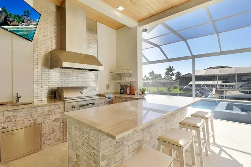 Enclosed patio outdoor kitchen with quartz countertops
