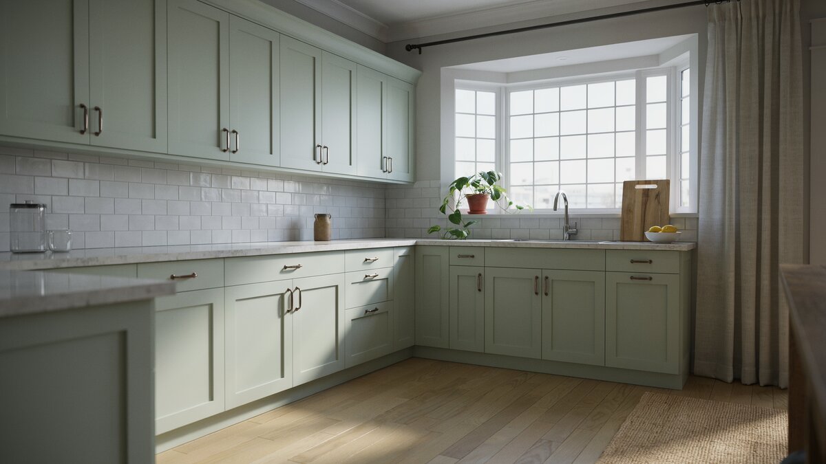 Inviting kitchen corner window framed by light green cabinets and white granite
